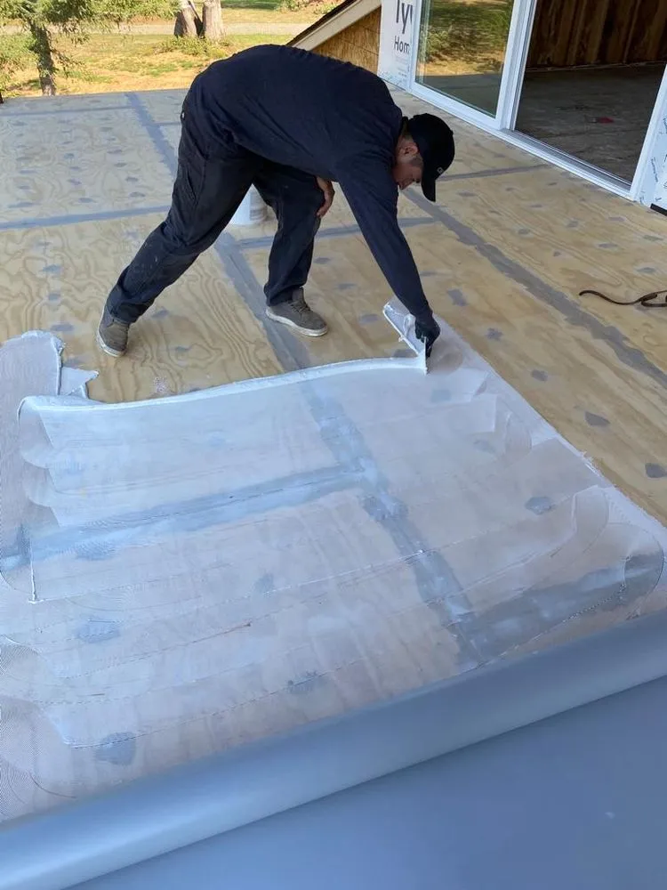 Slide of TR Roofing Company