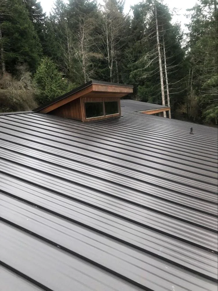 Slide of TR Roofing Company