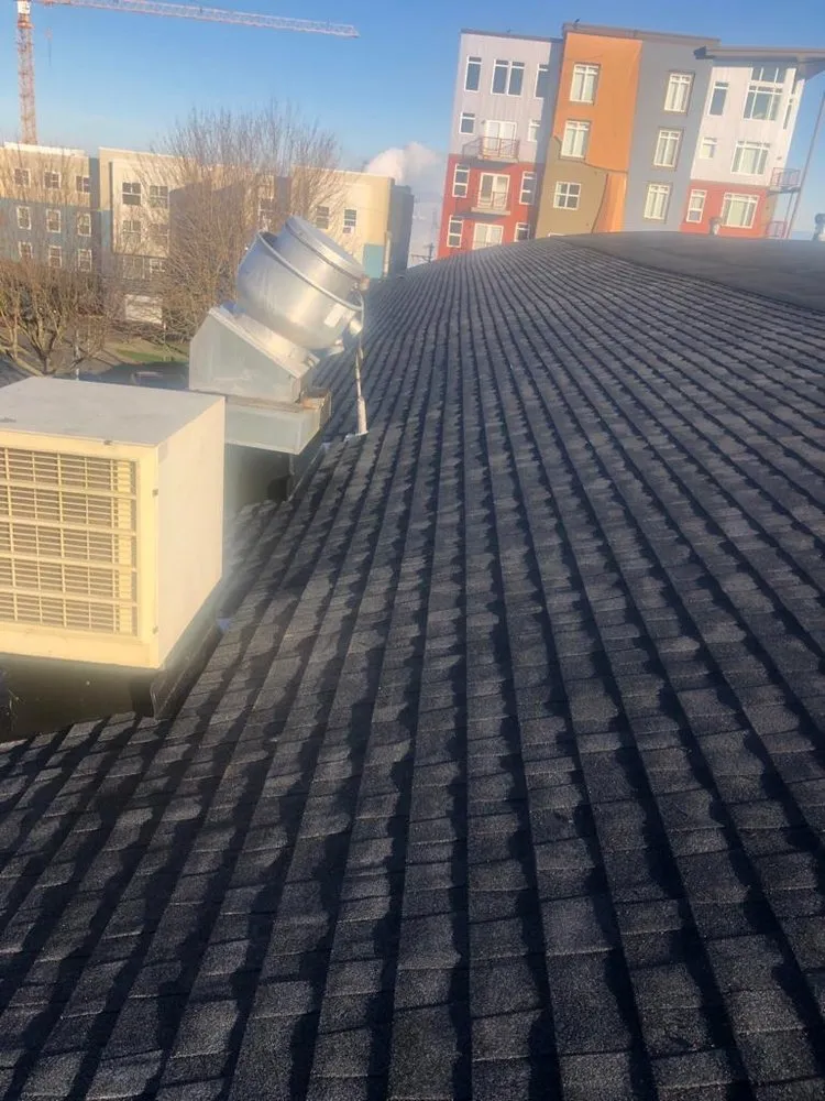 Slide of TR Roofing Company