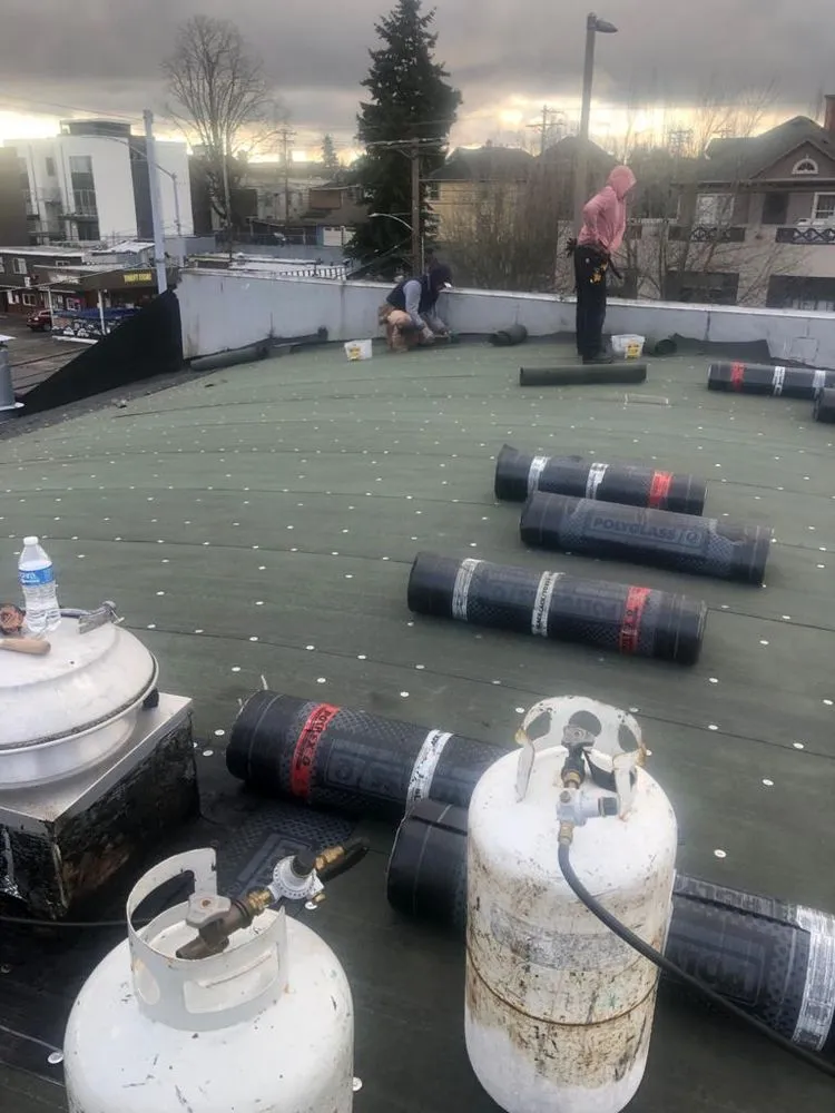 Slide of TR Roofing Company