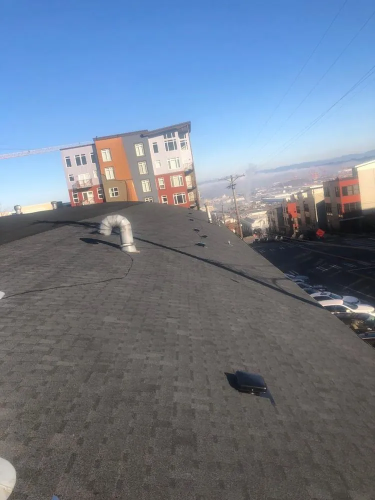 Slide of TR Roofing Company