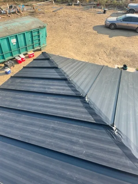 Slide of TR Roofing Company