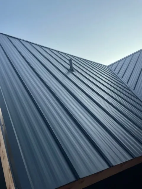 Slide of TR Roofing Company