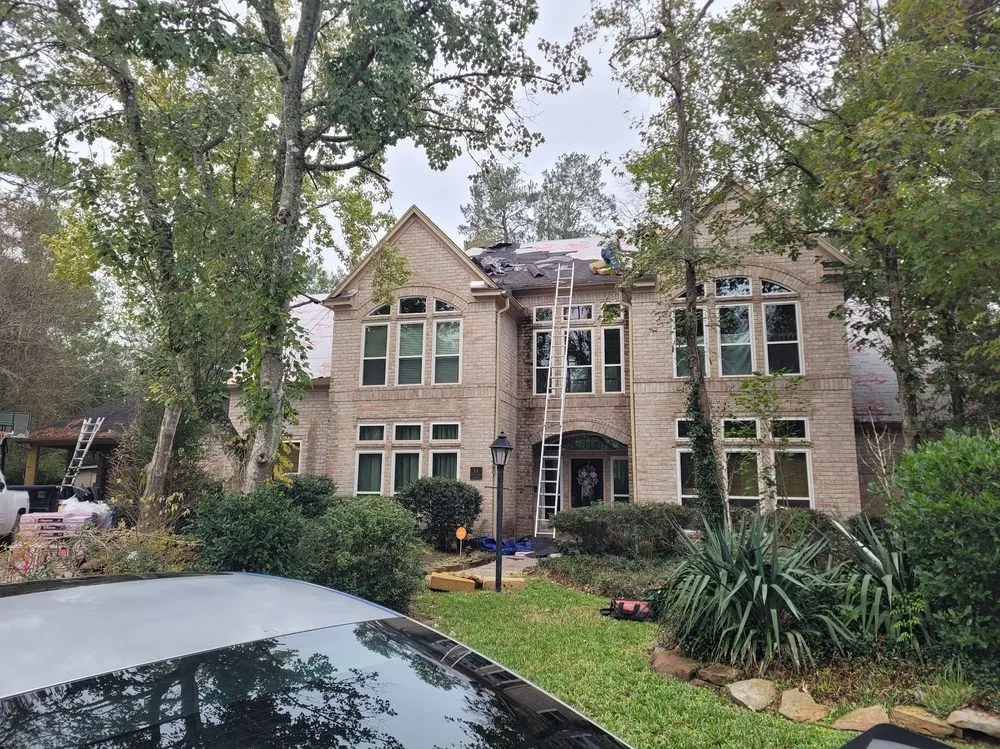 Slide of Trace Roofing & Construction