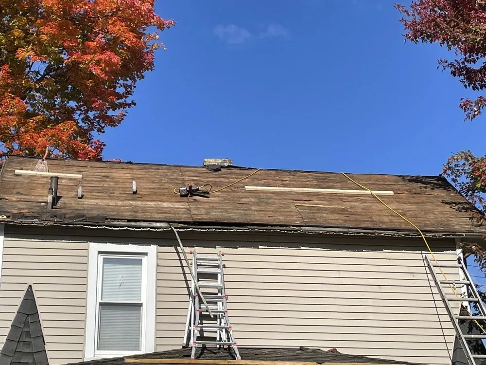 Slide of Tracy and Son Roofing and General Contracting