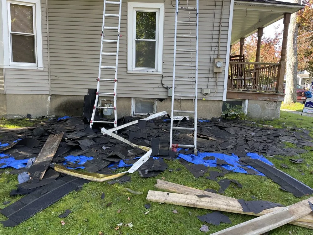 Slide of Tracy and Son Roofing and General Contracting