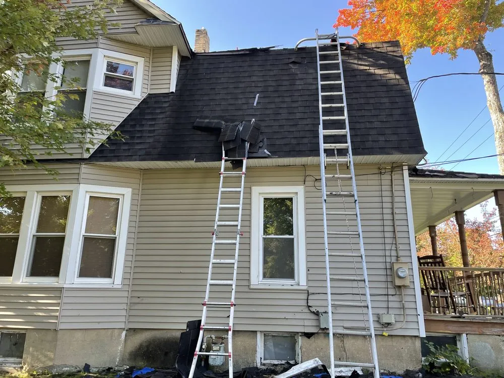 Slide of Tracy and Son Roofing and General Contracting