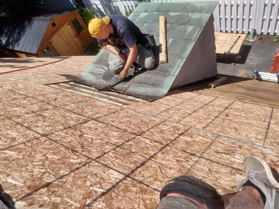 Slide of Tracy and Son Roofing and General Contracting