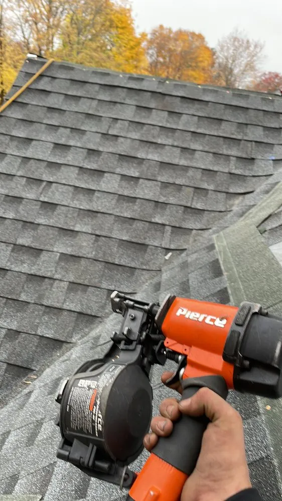 Slide of Tracy and Son Roofing and General Contracting