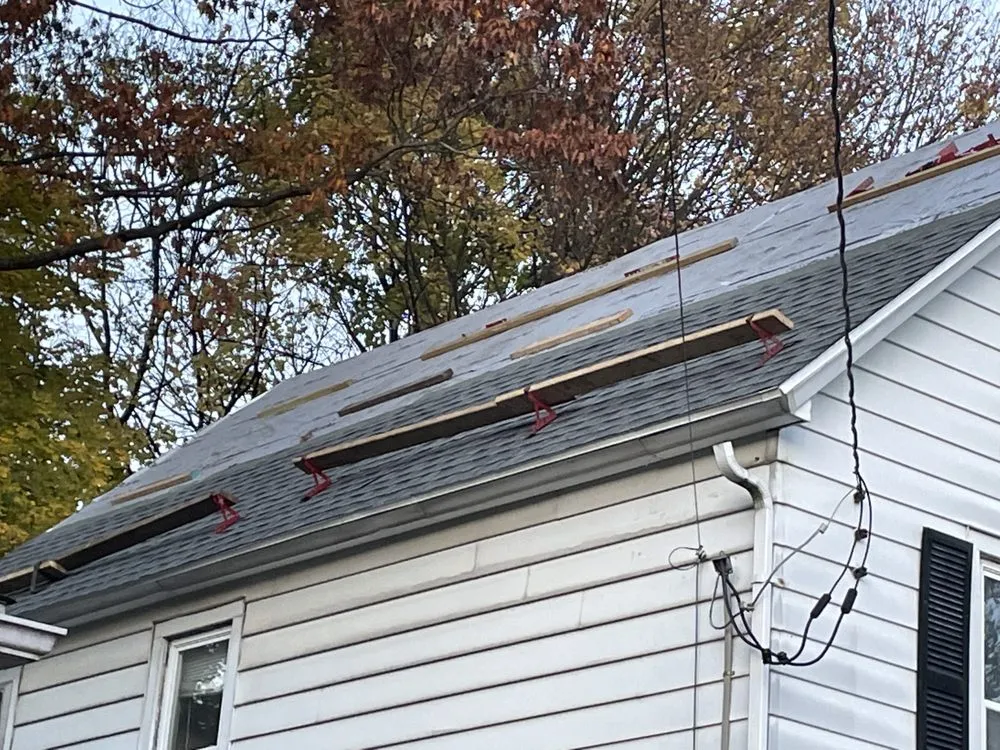 Slide of Tracy and Son Roofing and General Contracting