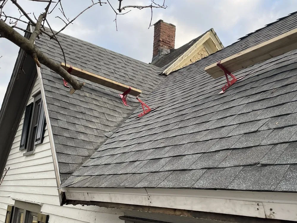 Slide of Tracy and Son Roofing and General Contracting