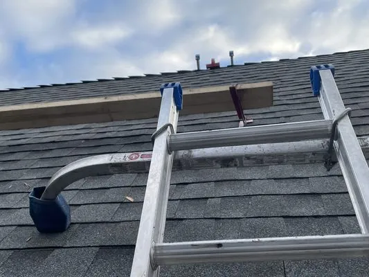 Tracy and Son Roofing and General Contracting Logo