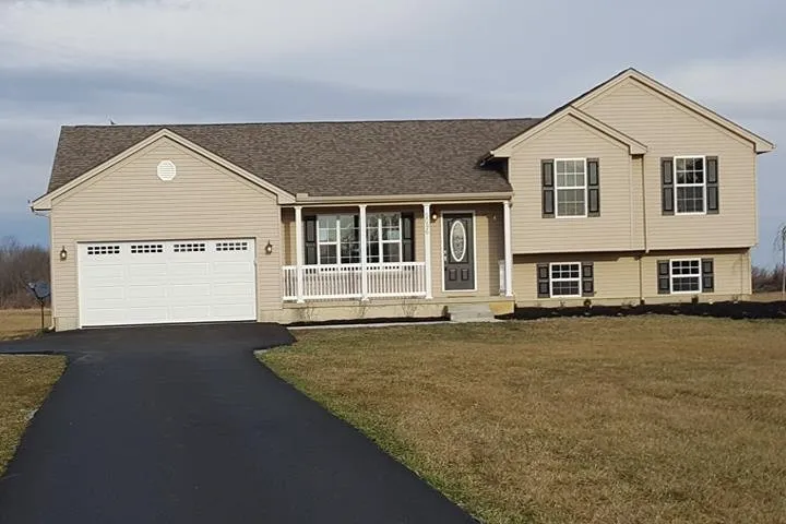 Slide of Tracy Roofing & Renovations