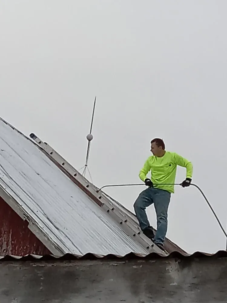 Slide of Tracy's Pro Roofing