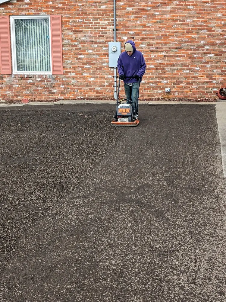 Slide of Tracy's Pro Roofing