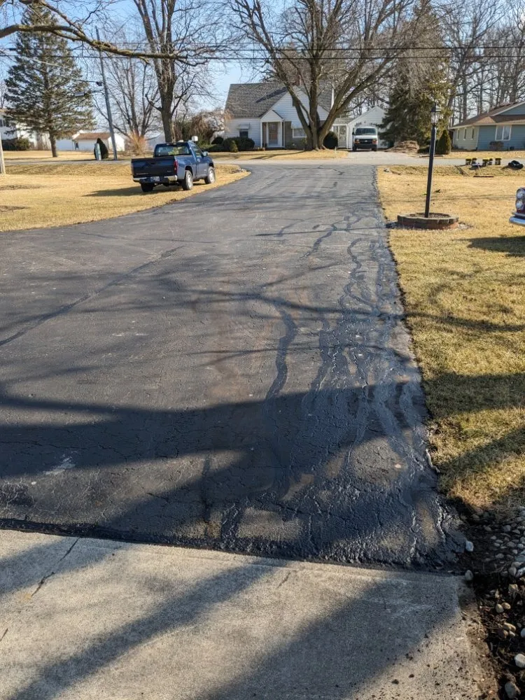 Slide of Tracy's Pro Roofing