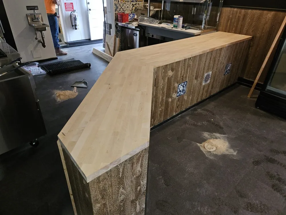 Slide of Trade Masters Construction