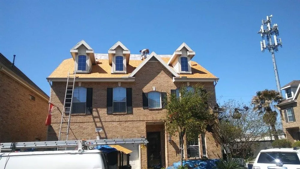 Slide of Trademark Roofing & Construction