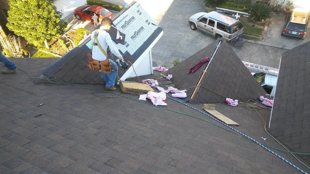 Slide of Trademark Roofing & Construction