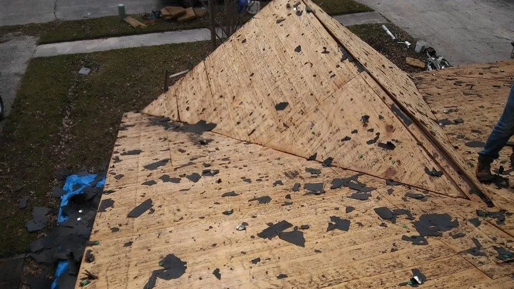 Slide of Trademark Roofing & Construction