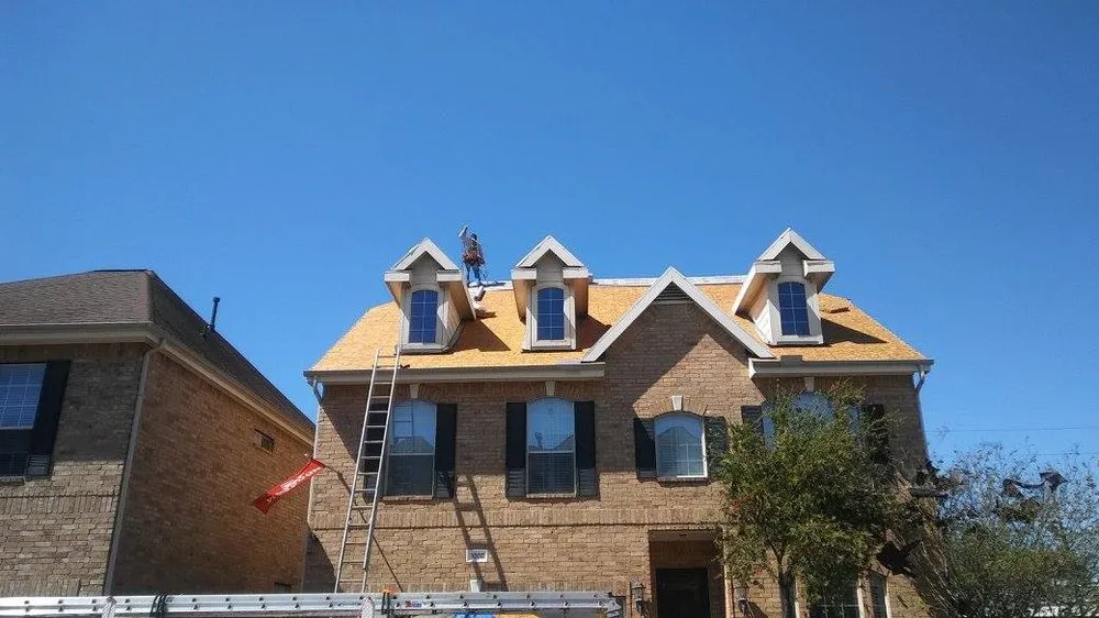 Slide of Trademark Roofing & Construction