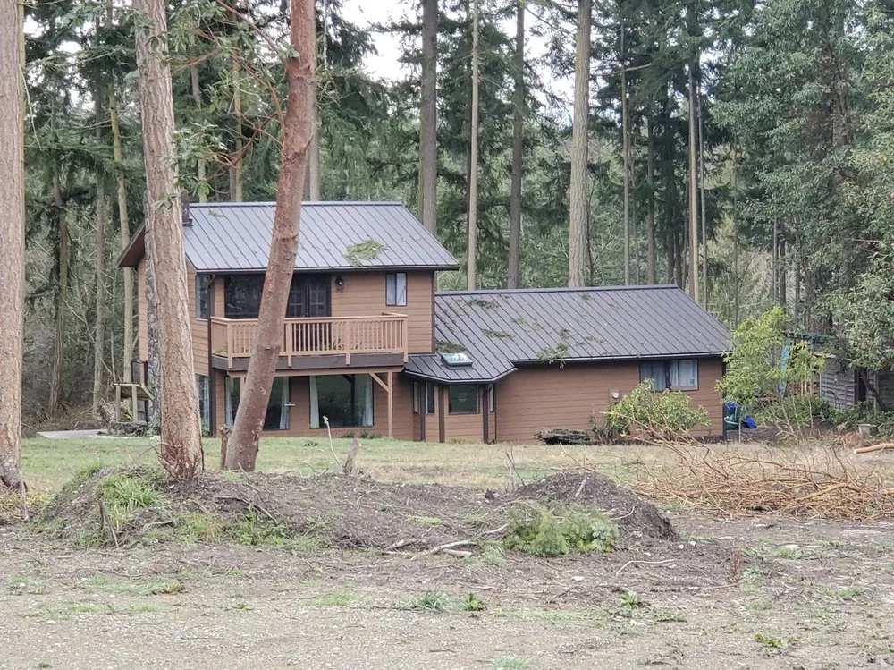 Slide of Trademark Roofing and Construction