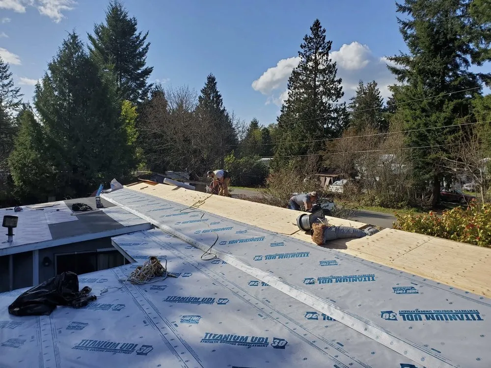 Slide of Trademark Roofing and Construction