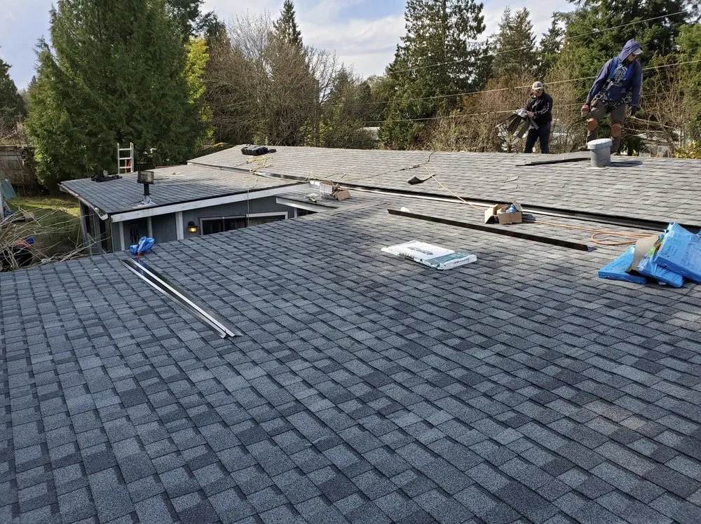 Slide of Trademark Roofing and Construction