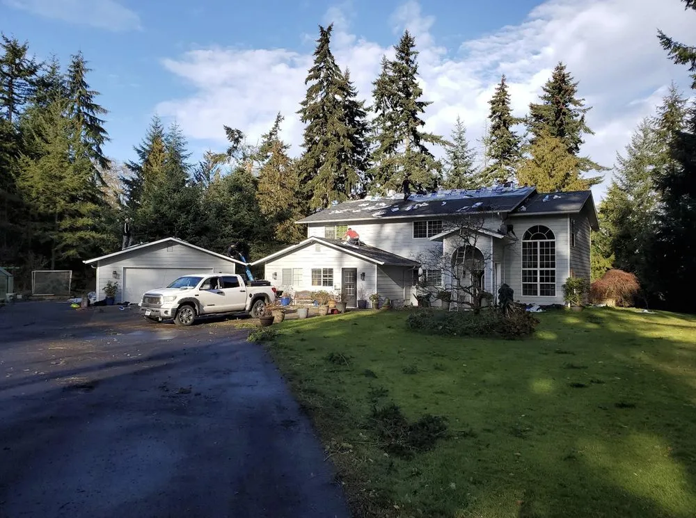 Slide of Trademark Roofing and Construction