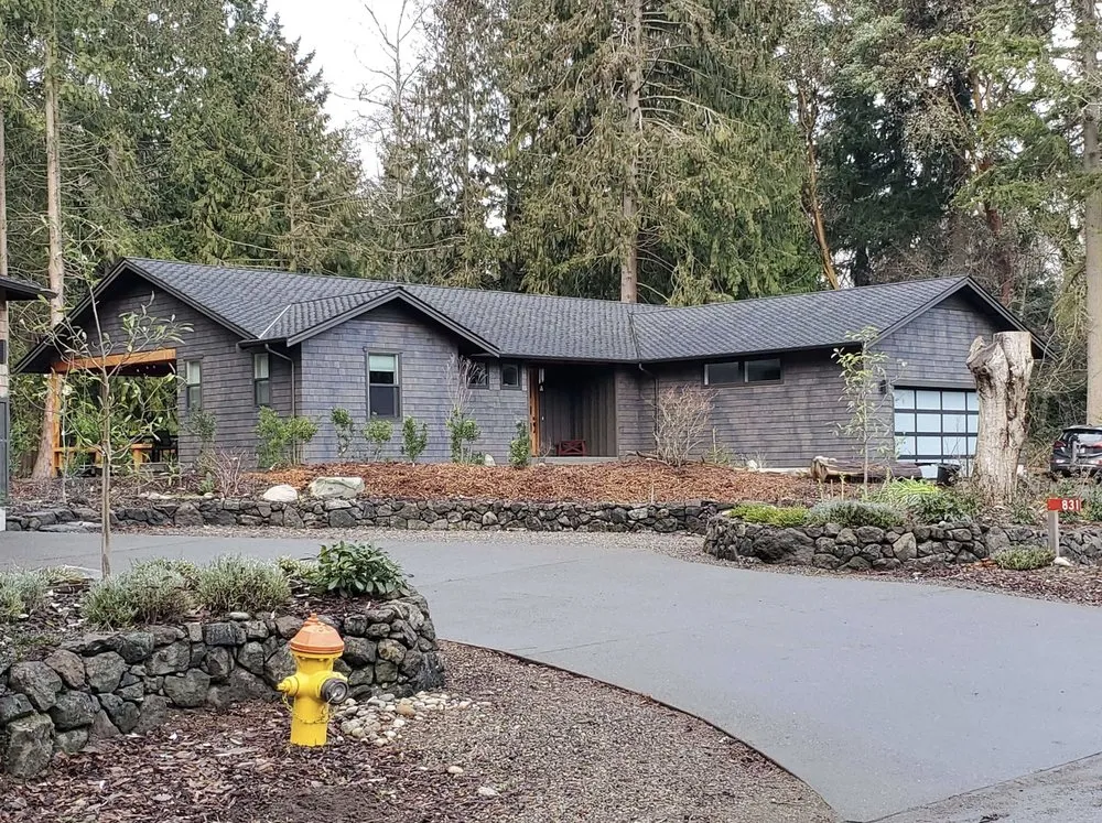 Slide of Trademark Roofing and Construction