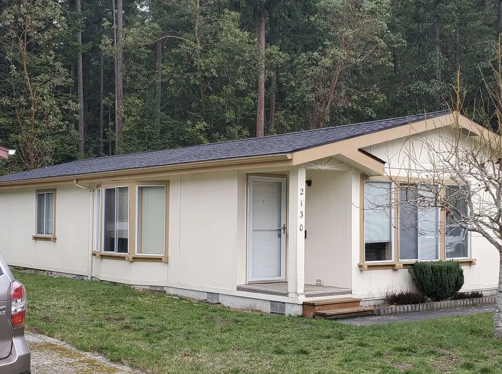 Slide of Trademark Roofing and Construction