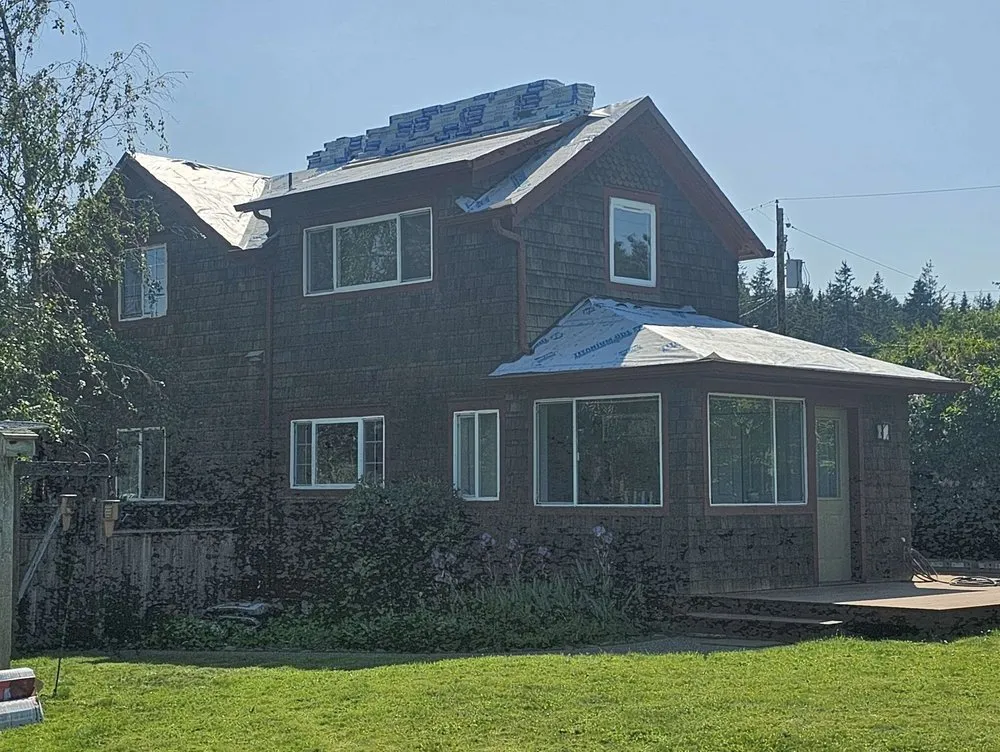 Slide of Trademark Roofing and Construction