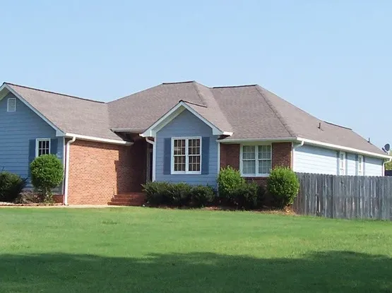 Slide of Trademark Roofing
