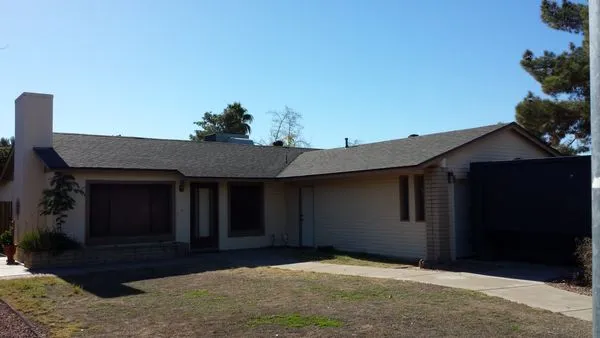 Trademark Roofing Logo