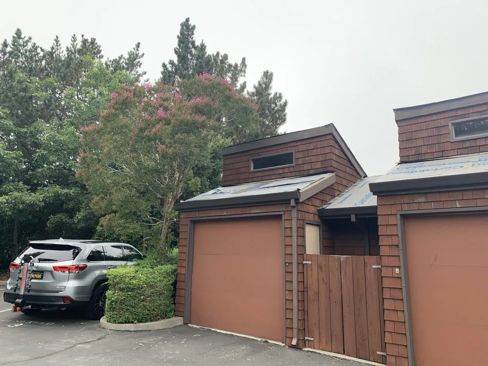 Slide of Trademark Roofing