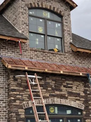 Tradesmen Roofing Logo