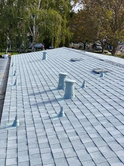 Slide of Tradition Roofing