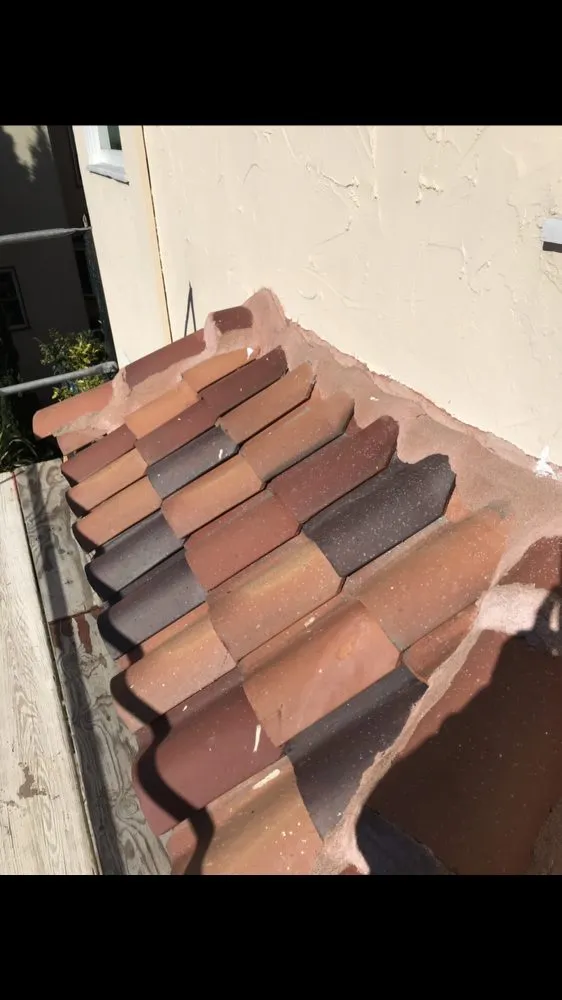 Slide of Tradition Roofing