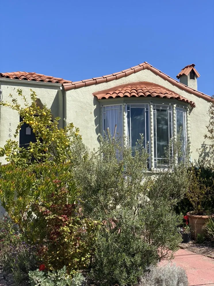 Slide of Tradition Roofing