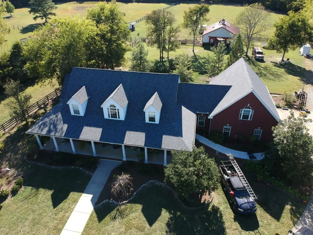 Slide of Traditions Roofing