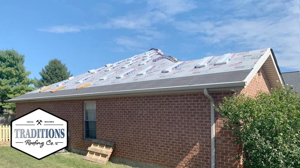 Slide of Traditions Roofing Company