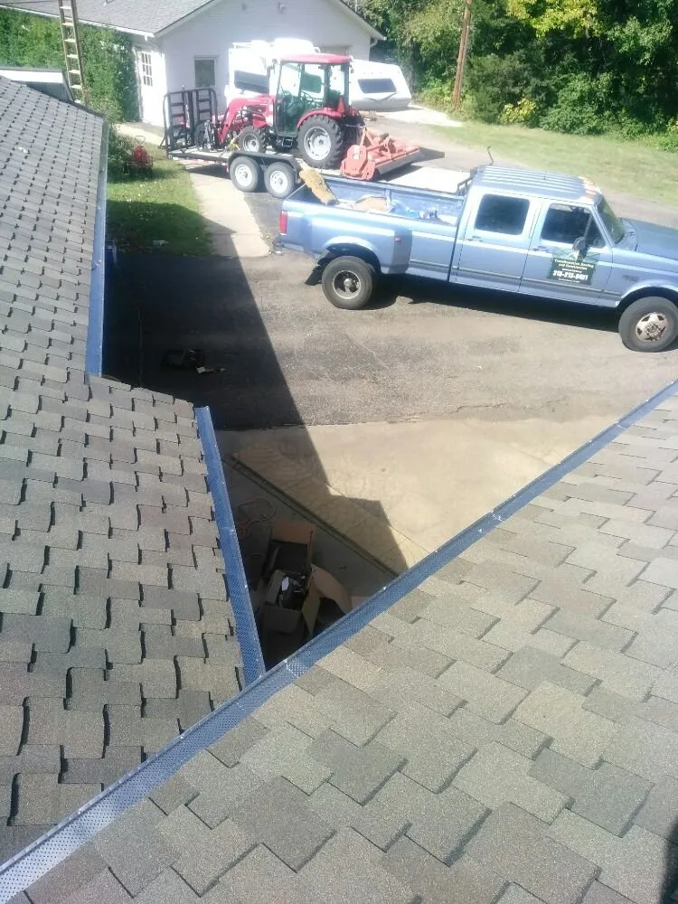 Slide of Transformation Roofing & Construction