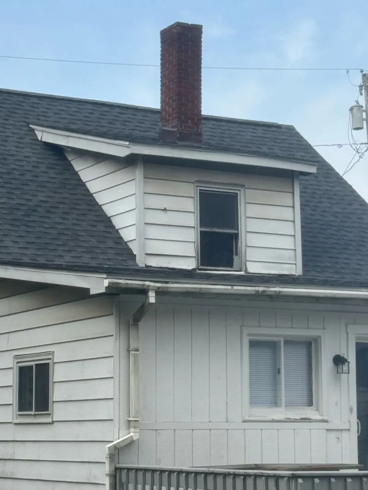 Slide of Travco Roofing