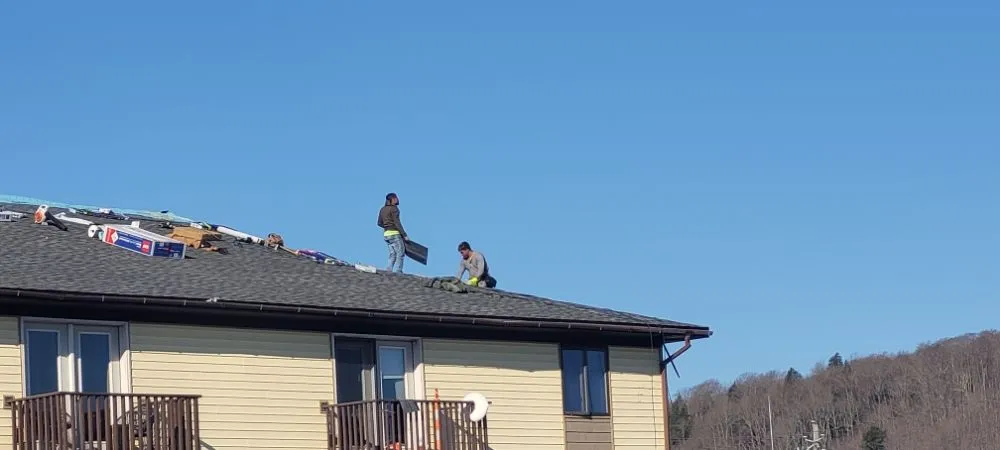 Trusted metal roofing installation for homes in Lake Leelanau, MI by Traverse City Exteriors