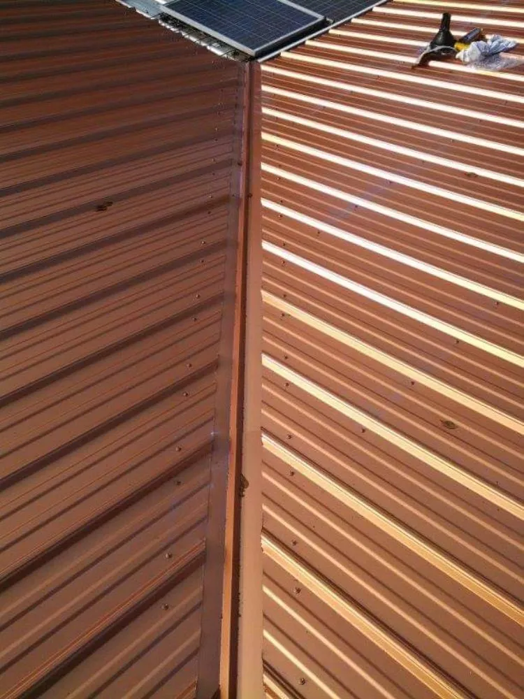 Slide of Travie T's Roofing Firm