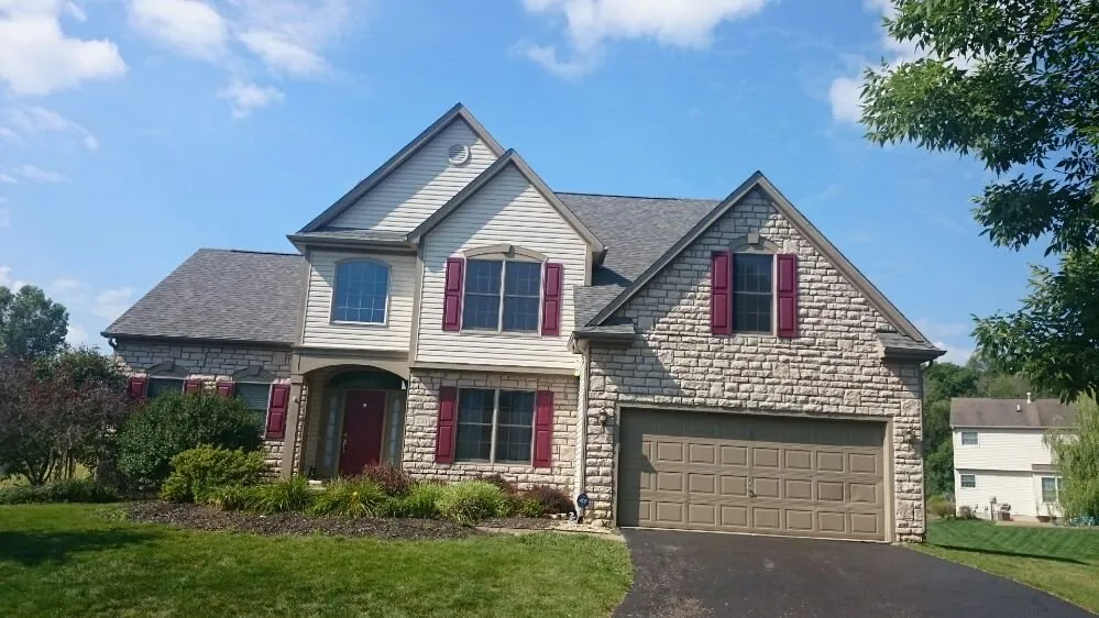 Slide of Travis Stevens Roofing