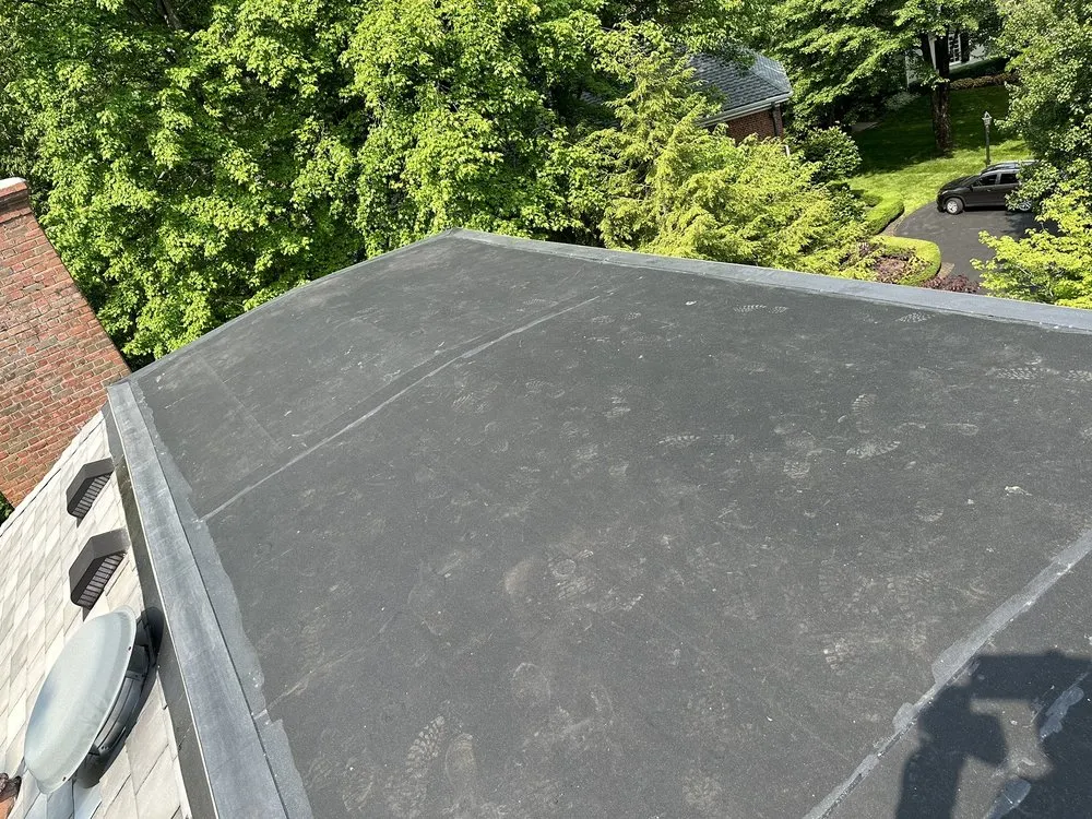 Slide of Travis Stevens Roofing