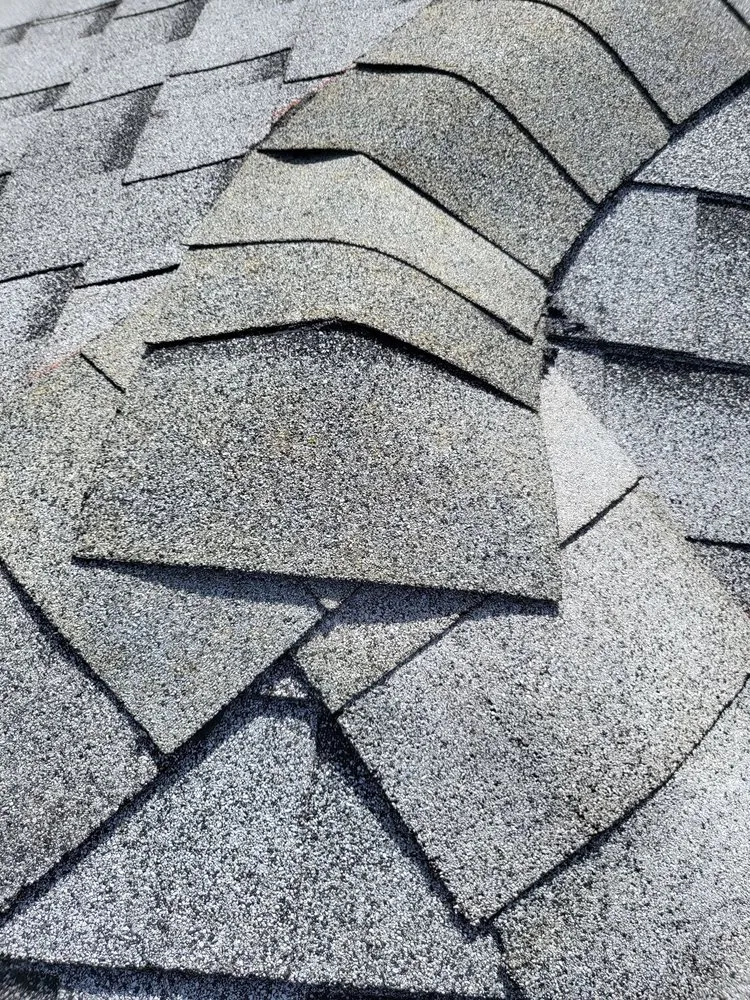 Slide of Treasure Coast Roofing