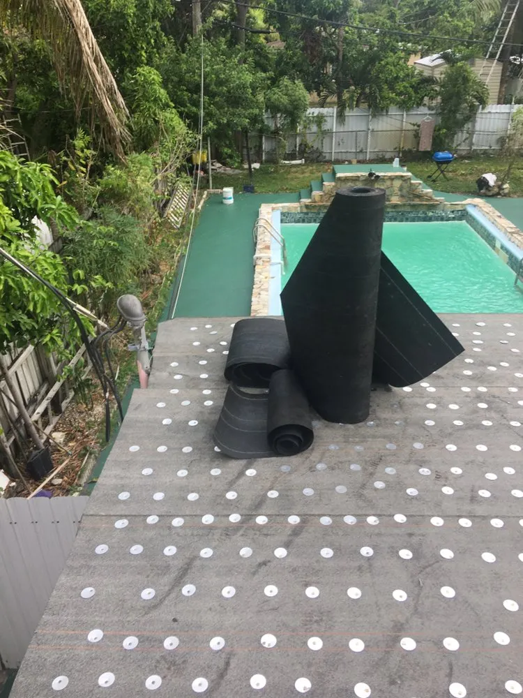 Slide of Tree Of The World Roofing