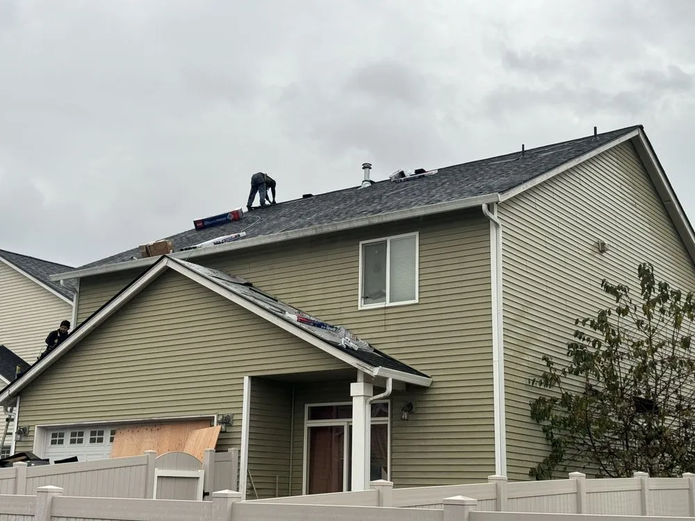 Slide of Trenick Roofing